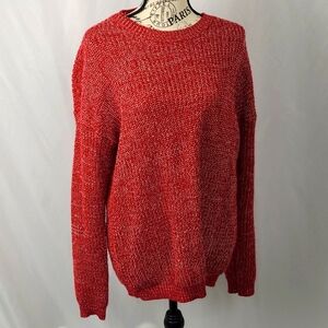 Red sweater heart elbow detail